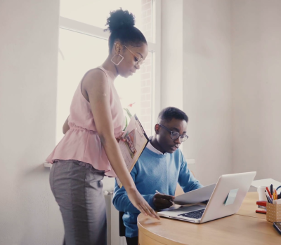 videoblocks-happy-black-female-manager-inspires-employees-mixed-ethnicity-young-smiling-people-work-in-modern-loft-trendy-office-4k_bwmfb1nog_thumbnail-full01